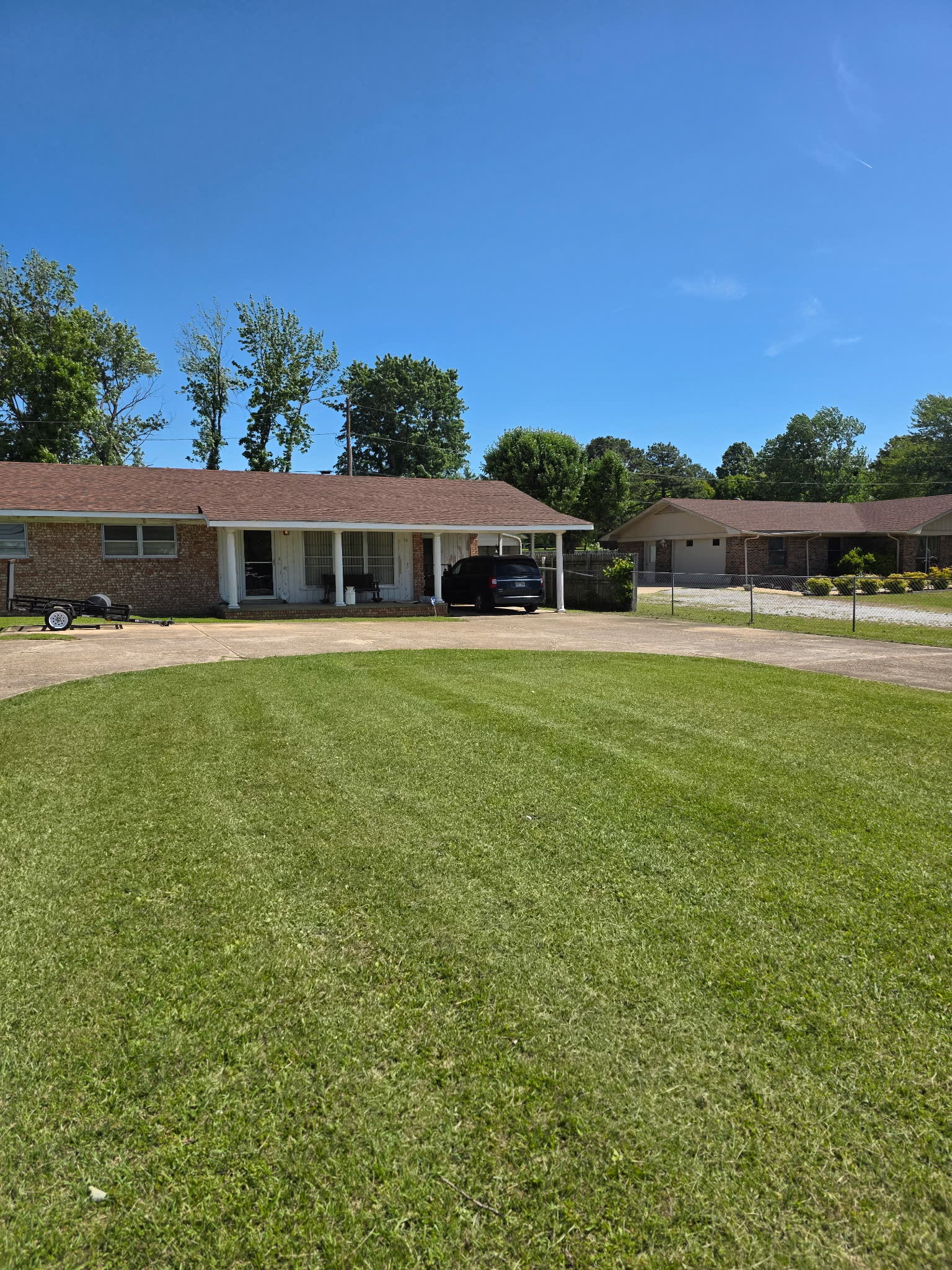 Freshly mowed front yard at a home in Mountain View, Arkansas